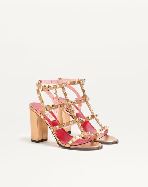 Valentino Garavani - Rockstud Laminated Calfskin Sandal With Straps 90mm - Gold - Woman - Sandals