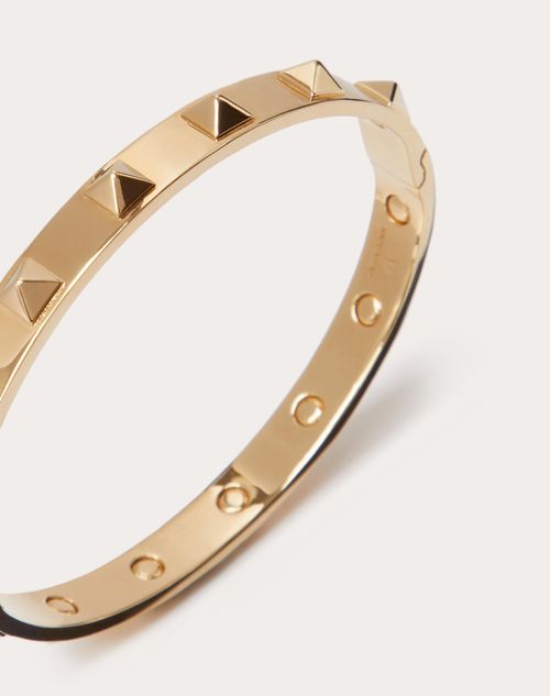 Rockstud Metal Bangle for Man in Gold | Valentino US