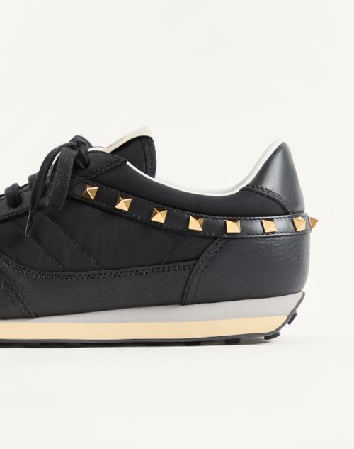 Valentino Garavani - Stud Up Trainer In Leather And Nylon - Black - Man - Trainers