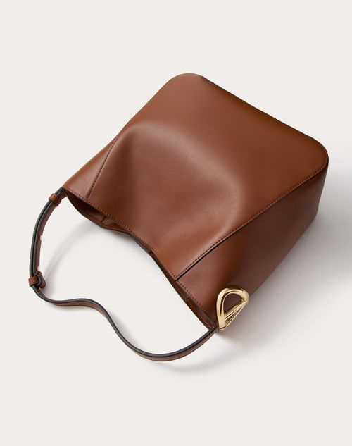 Vロゴ サイド ナッパレザー カーフスキン バケットバッグ for ウィメンズ インチ アイボリー | Valentino JP