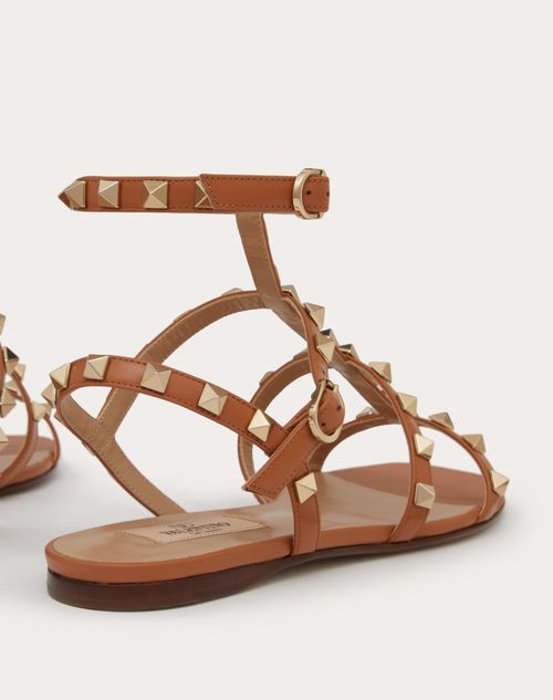 Rockstud Flat Calfskin Sandal With Straps for Woman in Poudre ...