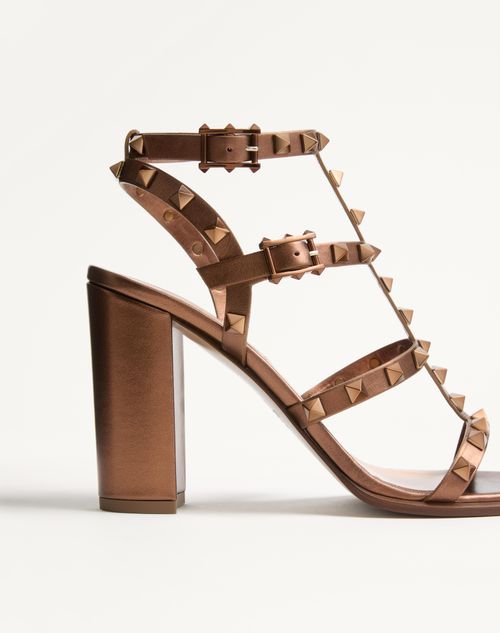 Rockstud Metallic Calfskin Leather Ankle Strap Sandal 90 Mm Rockstud Metallic Calfskin Leather Ankle Strap Sandal 90 Mm