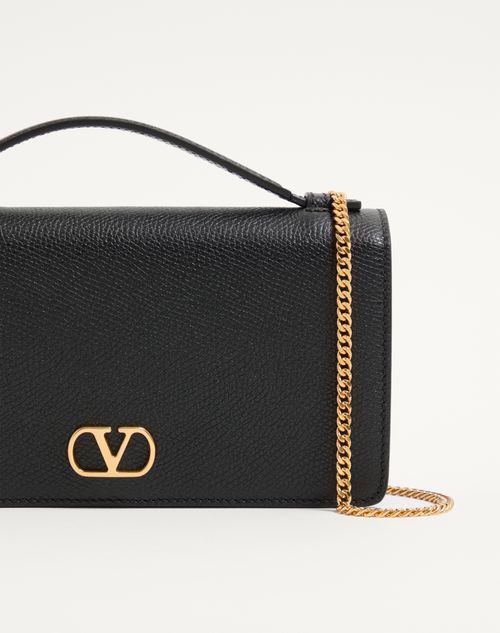 Valentino Garavani - Vlogo Signature Grainy Calfskin Wallet With Chain - Black - Woman - Clutches