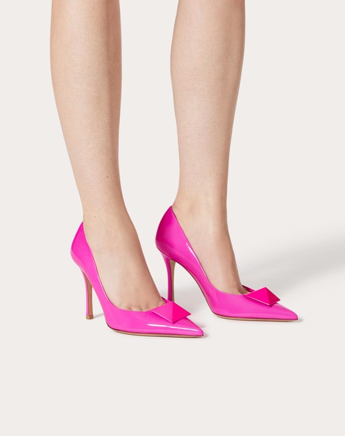 One Stud patent leather pumps