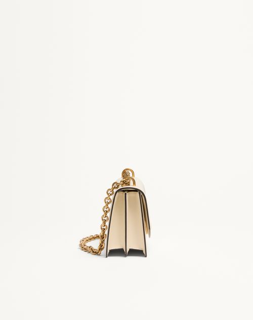 Valentino Garavani - Valentino Garavani Vain Small Shoulder Bag In Shiny Calfskin - Butter - Woman - Shoulder Bags