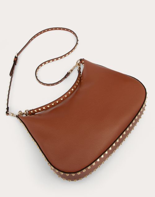 Rockstud Hobo Bag In Grainy Calfskin for Woman in Saddle Brown