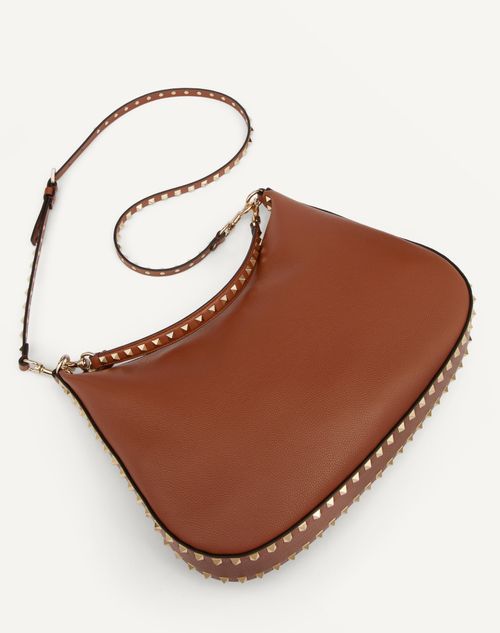 Rockstud Hobo Bag In Grainy Calfskin for Woman in Saddle