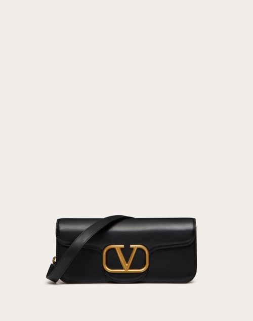 Shop Valentino Garavani Locò Calfskin Crossbody Bag In Black