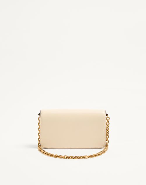 Valentino Garavani - Valentino Garavani Vain Clutch Bag In Shiny Calfskin - Butter - Woman - Clutches