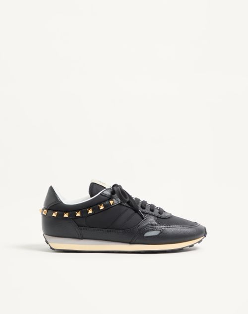 Valentino Garavani - Stud Up Trainer In Leather And Nylon - Black - Man - Trainers