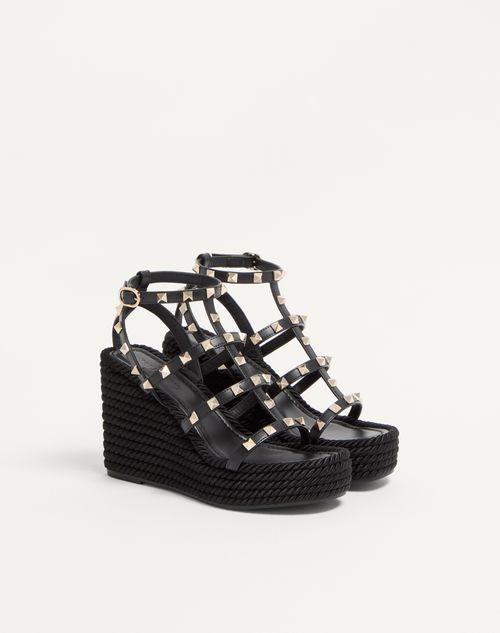 Valentino Garavani - Rockstud Ankle Strap Wedge Sandal In Calfskin Leather 95 Mm - Black - Woman - Espadrilles And Wedges