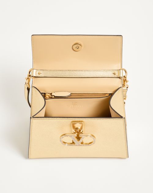 Valentino Garavani - Valentino Garavani Vsling Small Handbag In Laminated Calfskin With Jewel Logo - Antique Brass - Woman - Top Handle Bags