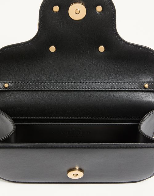 Valentino Garavani - Valentino Garavani Locò Small Shoulder Bag In Calfskin - Black - Woman - Shoulder Bags