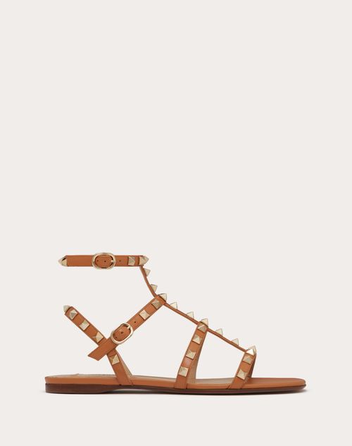 Shop Valentino Garavani Rockstud Flat Calfskin Sandal With Straps Woman Almond 39.5