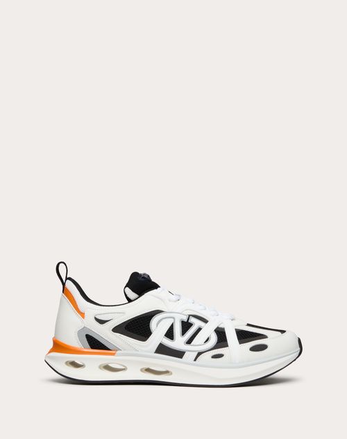 Shop Valentino Garavani Vlogo Easyjog Low-top Sneaker In Calfskin And Fabric In Black/white/pastel Grey/orange