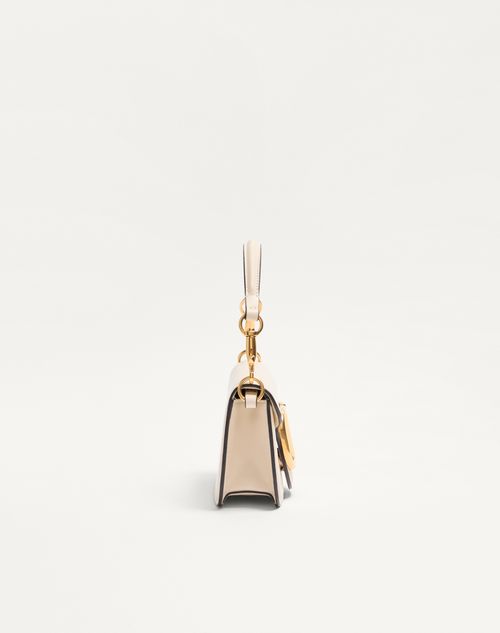 Valentino Garavani - Valentino Garavani Locò Small Shoulder Bag In Calfskin - Light Ivory - Woman - Shoulder Bags
