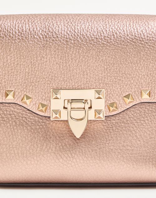 Valentino Garavani - Valentino Garavani Rockstud Small Crossbody Bag In Laminated Grainy Calfskin Leather - Rose Cannelle - Woman - Shoulder Bags