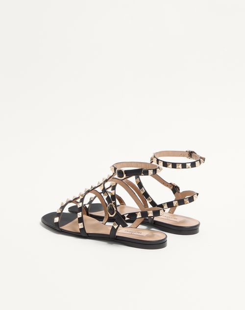 Valentino Garavani - Rockstud Flat Calfskin Sandal With Straps - Black - Woman - Sandals