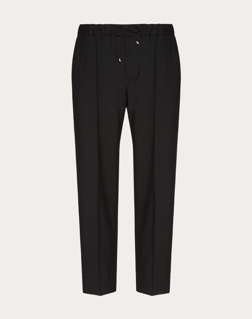 Shop Valentino Wool Trousers In ブラック