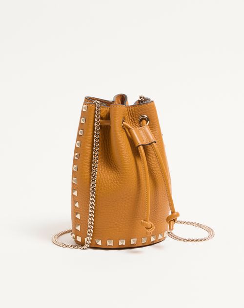 Valentino Garavani - Mini Rockstud Bucket Bag In Grainy Calfskin - Golden Cuir - Woman - Clutches