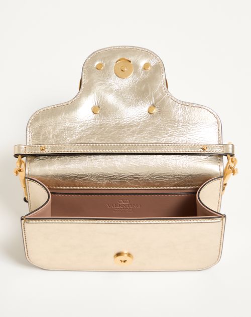 Valentino Garavani - Small Valentino Garavani Locò Metallic Calfskin Shoulder Bag - Platinum - Woman - Shoulder Bags