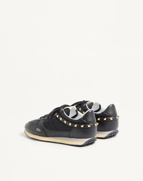Valentino Garavani - Stud Up Trainer In Leather And Nylon - Black - Man - Trainers