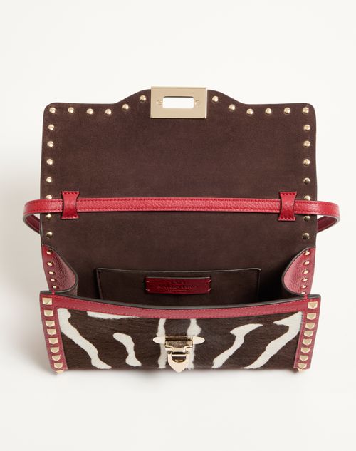 Valentino Garavani - Valentino Garavani Rockstud Small Shoulder Bag In Pony-effect Calfskin - White/marrone/red - Woman - Shoulder Bags