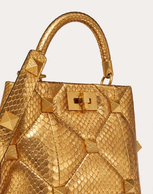 Valentino Garavani - Small Roman Stud The Handle Bag In Metallic Snakeskin - Antique Brass - Woman - Top Handle Bags