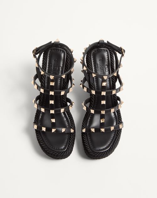 Valentino Garavani - Rockstud Ankle Strap Wedge Sandal In Calfskin Leather 95 Mm - Black - Woman - Espadrilles And Wedges