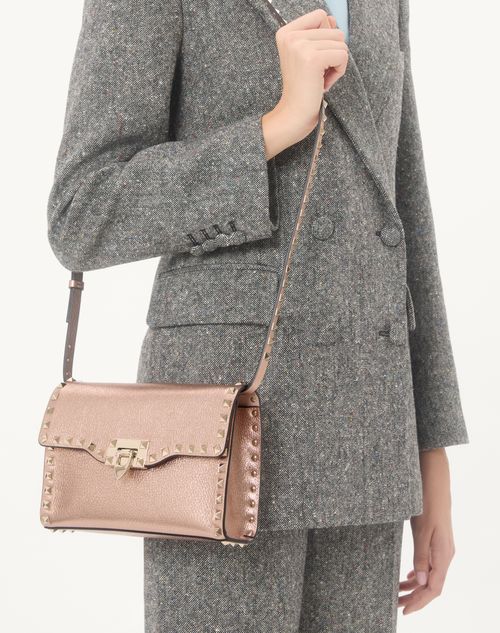 Valentino Garavani - Valentino Garavani Rockstud Small Crossbody Bag In Laminated Grainy Calfskin Leather - Rose Cannelle - Woman - Shoulder Bags