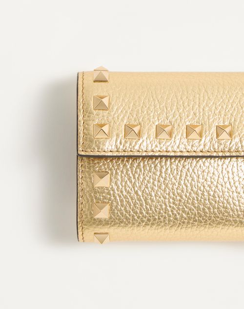 Valentino Garavani - Rockstud Trifold Wallet In Laminated Grainy Calfskin - Antique Brass - Woman - Wallets And Small Leather Goods