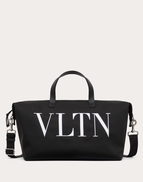 Shop Valentino Garavani Vltn Nylon Travel Bag In Black/white