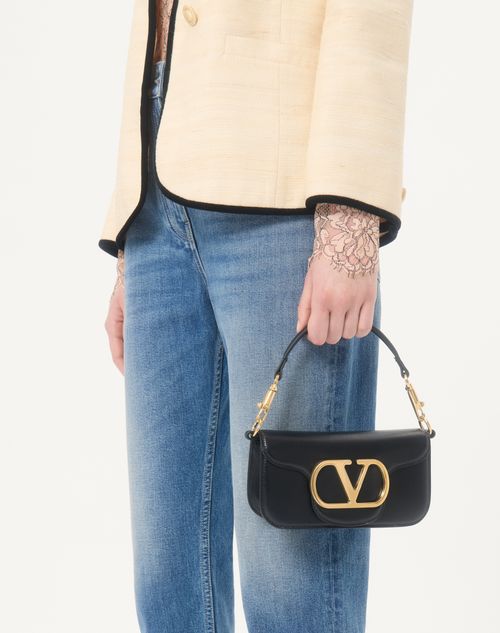Valentino Garavani - Valentino Garavani Locò Small Shoulder Bag In Calfskin - Black - Woman - Shoulder Bags