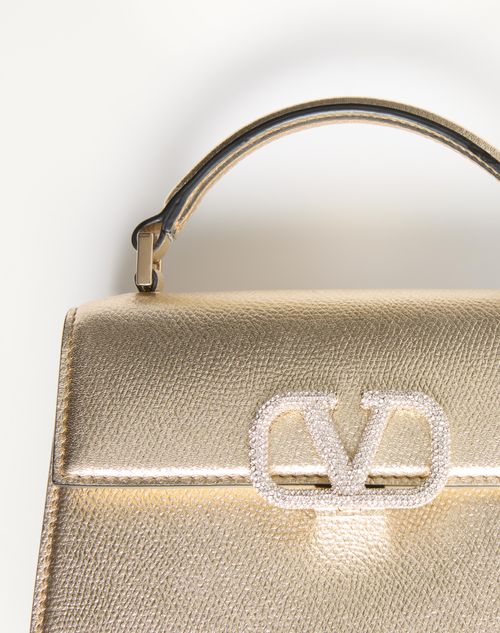 Valentino Garavani - Mini Vsling Handbag In Metallic Grainy Calfskin - Platinum/crystal - Woman - Top Handle Bags