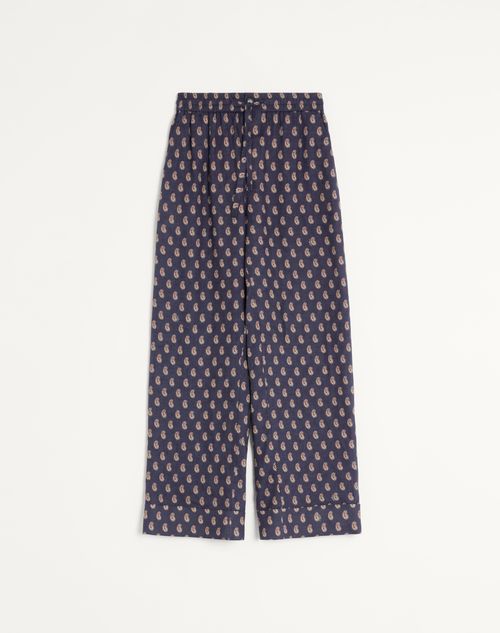 Valentino Lightweight Cuffed Linen Trousers With Voyage Imaginaire Print In Blue