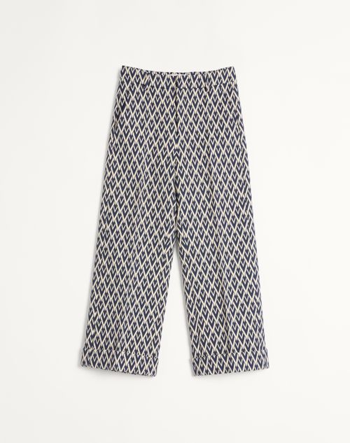 Shop Valentino Wool Trousers With Cuffs With Toute La V Jacquard Pattern In Blue/ivory