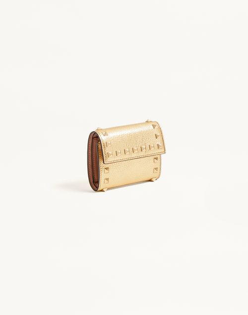 Valentino Garavani - Rockstud Trifold Wallet In Laminated Grainy Calfskin - Antique Brass - Woman - Wallets And Small Leather Goods