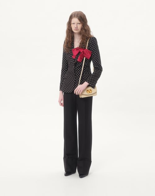 Valentino Garavani - Valentino Garavani Vain Clutch Bag In Shiny Calfskin - Butter - Woman - Clutches
